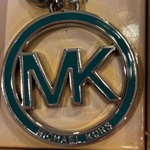 Michael Kors Silver Tone Key Chain Bag Charm with Teal MK Logo New in MK Box - Picture 1 of 2